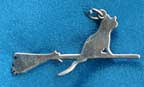 Another brooch, a cat on a broom. You can buy it on the same site. Enlarging it works as well.